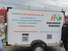 Michael Gold spendet Anhänger-Beschriftung für das Spielmobil